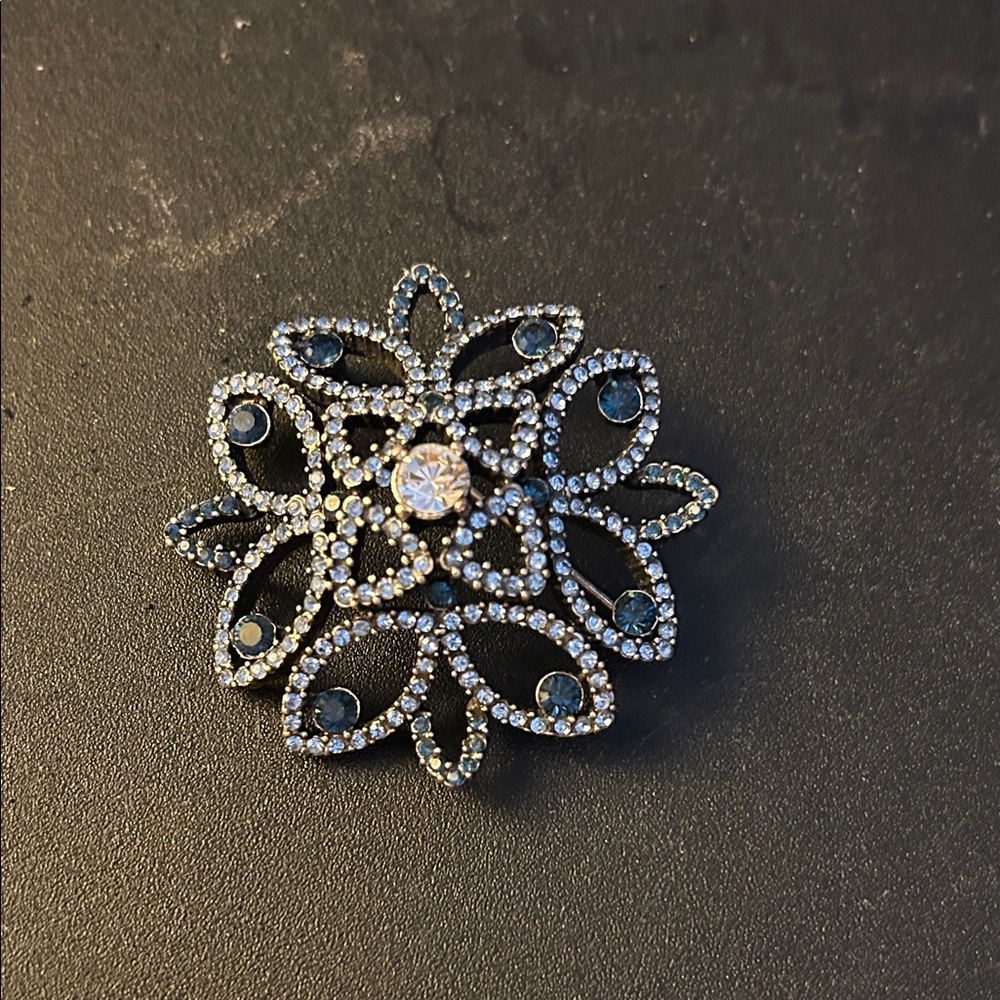 Intricate Black and Silver Brooch